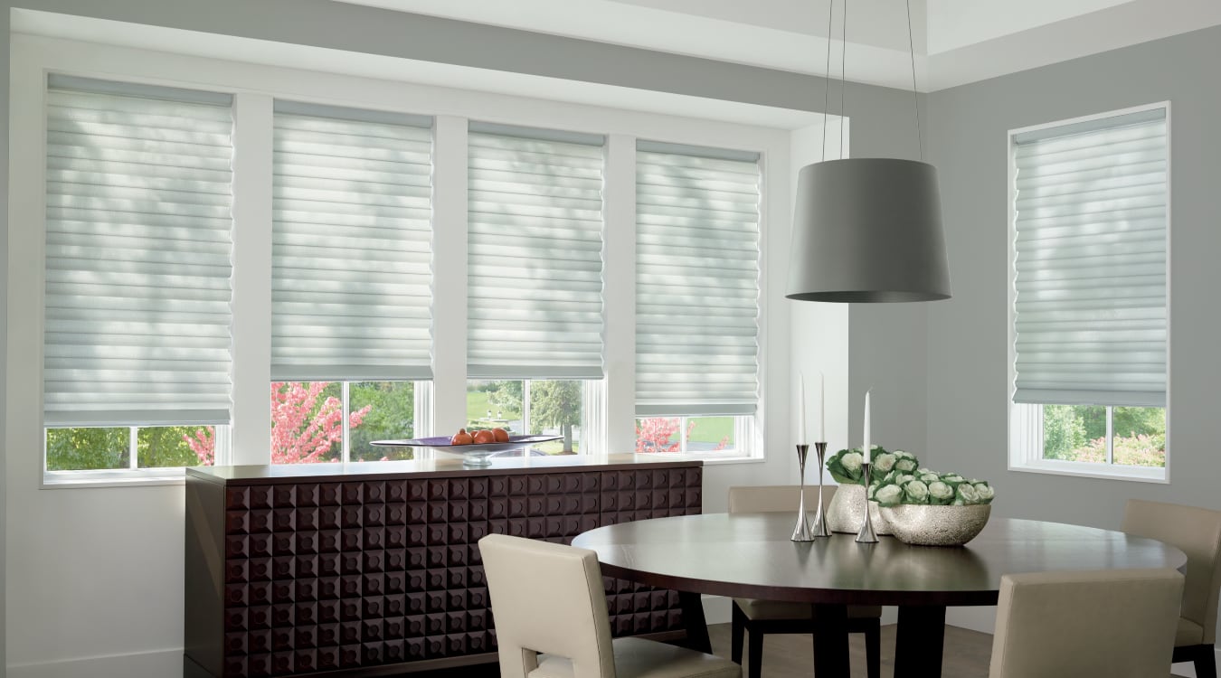 Cordless motorized shades in a St. George dining room